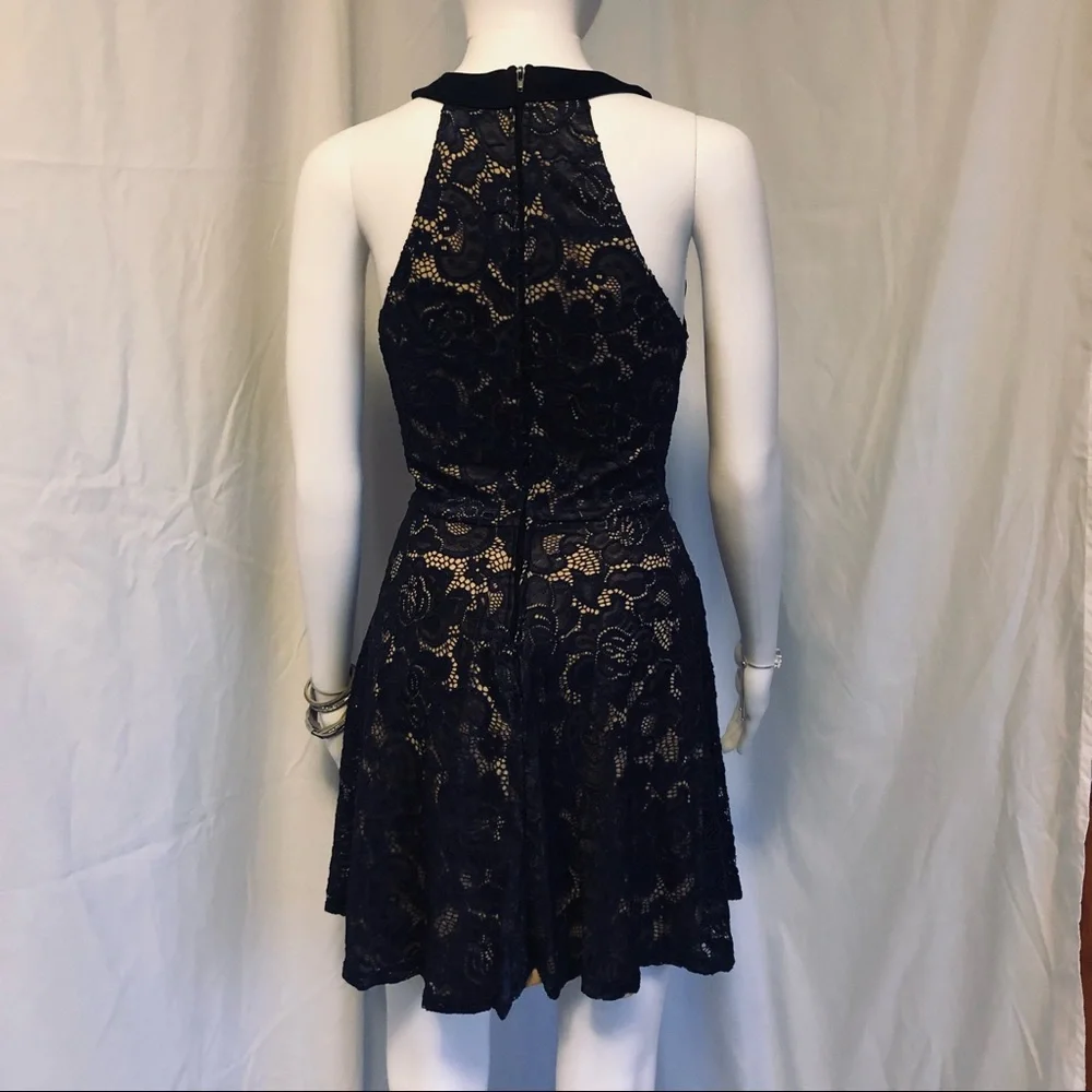 Crystal Doll 5 navy lace over nude halter mini dress - Picture 2 of 9